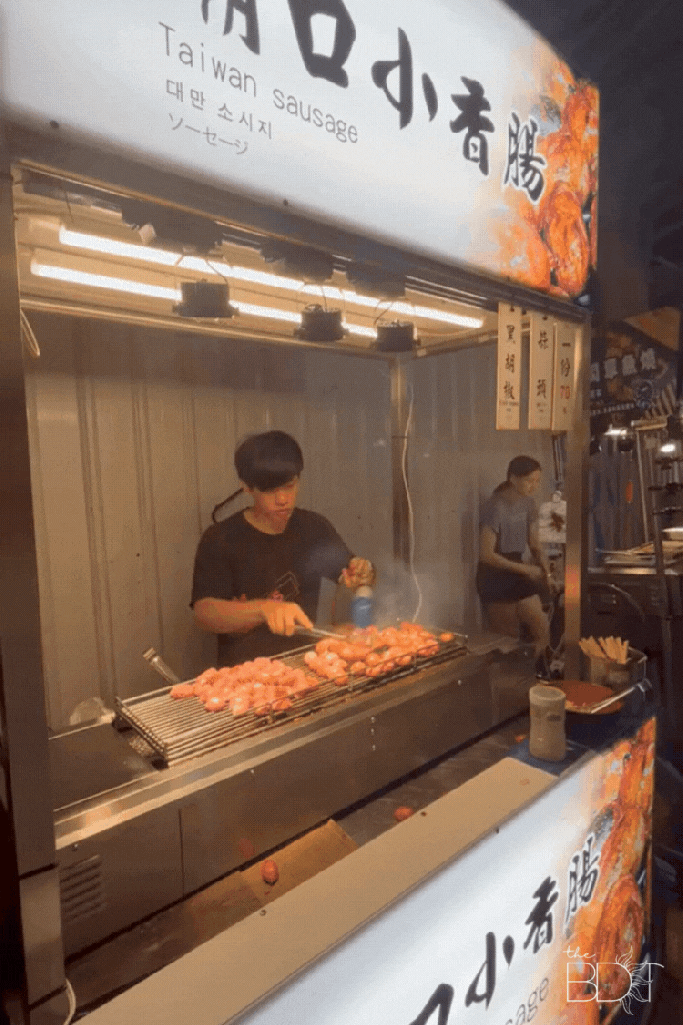 Taiwan sausages being prepared in a stall in Shilin Night Market 
